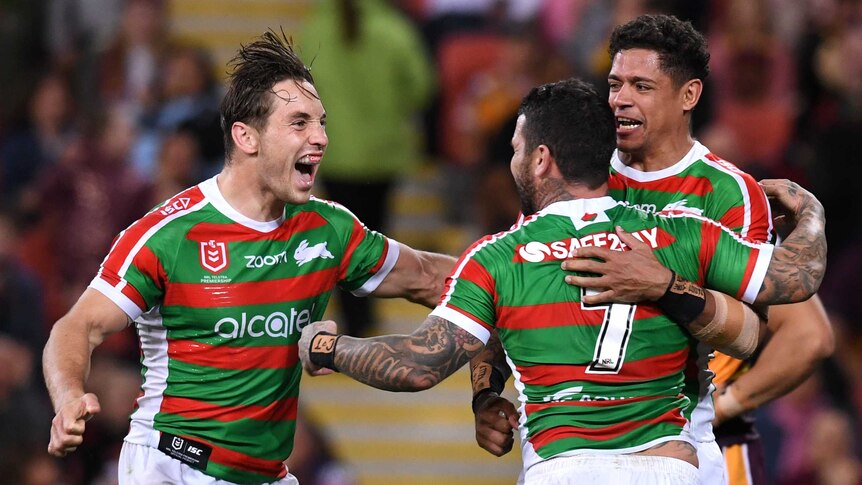 Rabbitohs celebrate a try against the Broncos
