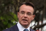 Michael O'Brien gestures during a press conference.