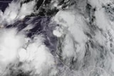 A satellite image shows Tropical Storm Nate moving over Nicaragua.