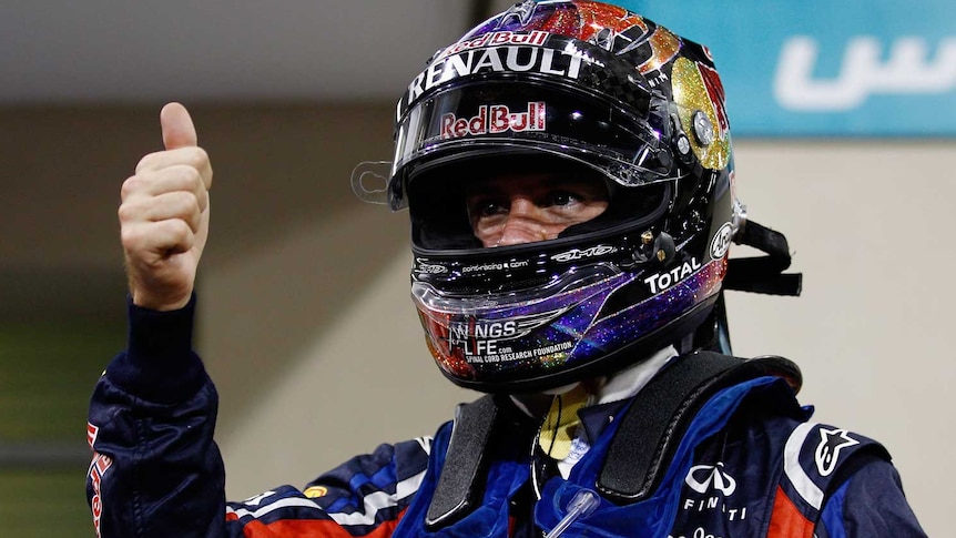 Vettel celebrates pole in Abu Dhabi