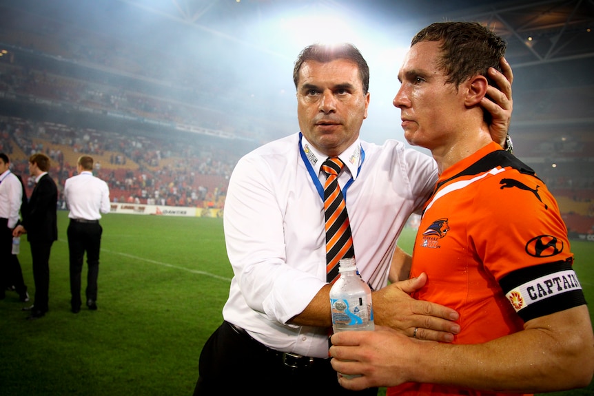 Not giving up ... Roar coach Ange Postecoglou and captain Matt Smith are aiming to keep the Premier's Plate