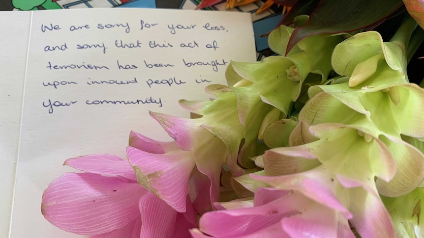 Flowers and card left at the Darwin mosque.