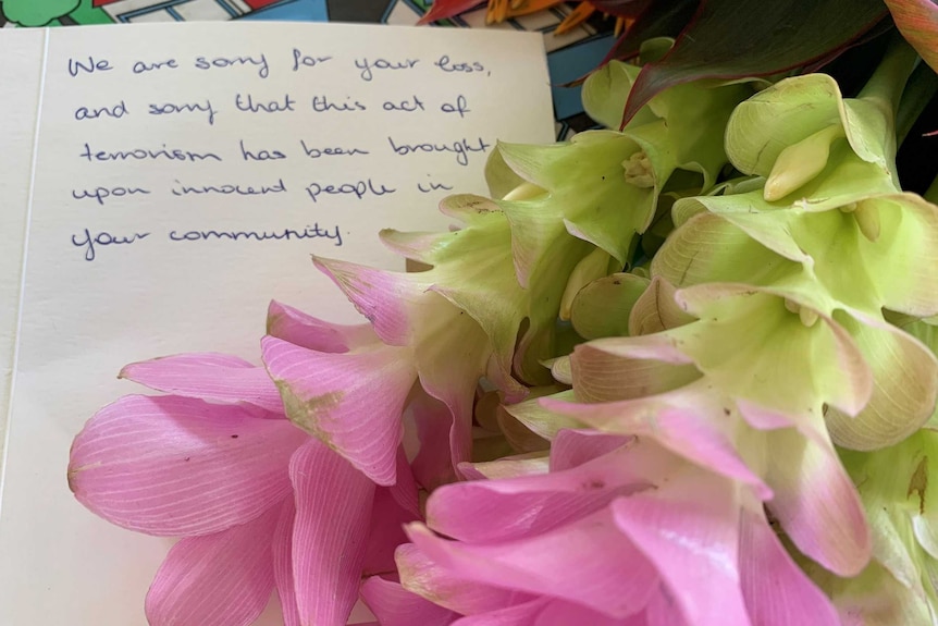 Flowers and card left at the Darwin mosque.