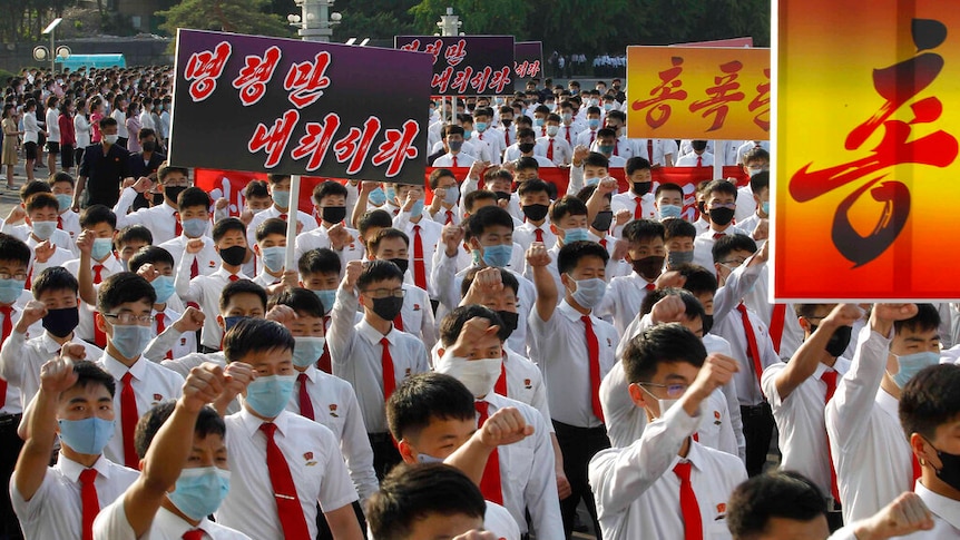 North Korean youth and students march from the Pyongyang Youth Park Open-air Theatre to Kim Il Sung Square.