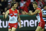 Will Hayward and Kieran Jack celebrate a goal against Geelong