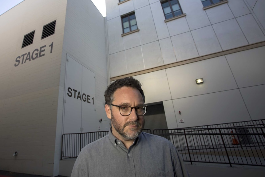 Director Colin Trevorrow poses outside "Stage 1" at Universal Studios