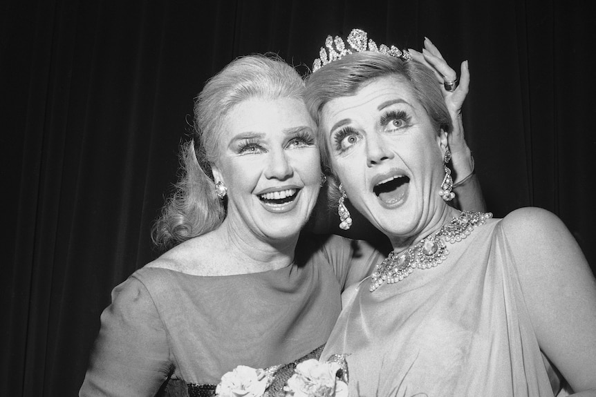 Ginger Roberts crowns Angela Lansbury with the crown of Miss Ziegfeld.