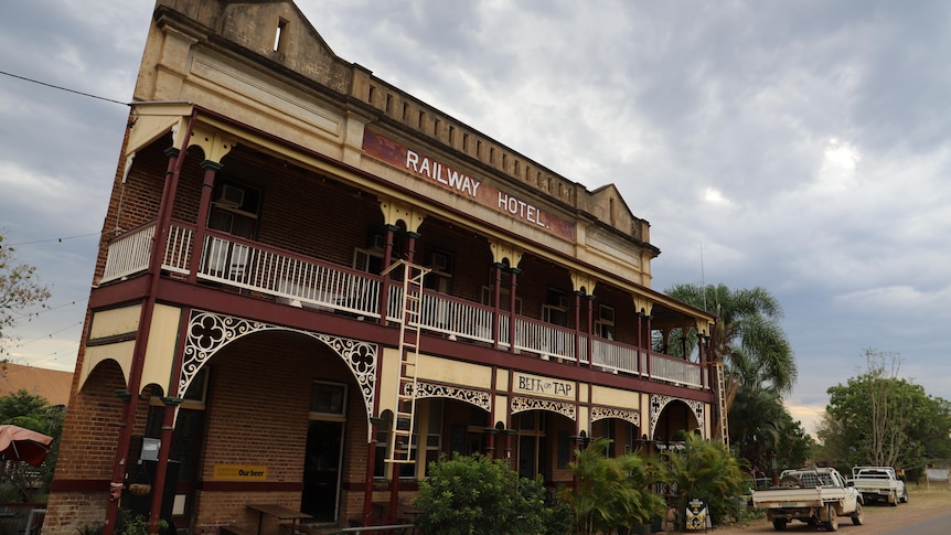 An old-style hotel with a detailed verandah.