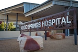 A sign for the Alice Springs Hospital, out the front of the healthcare facility