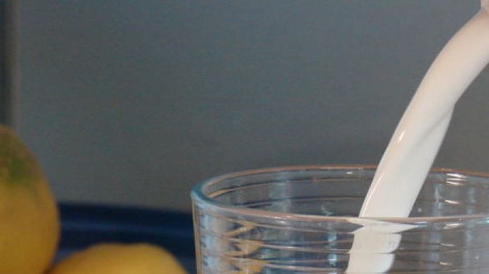 Milk being poured into a glass