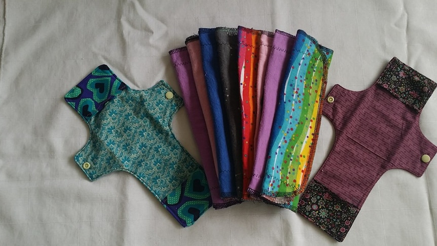 A set of reusable sanitary pads with colourful designs.