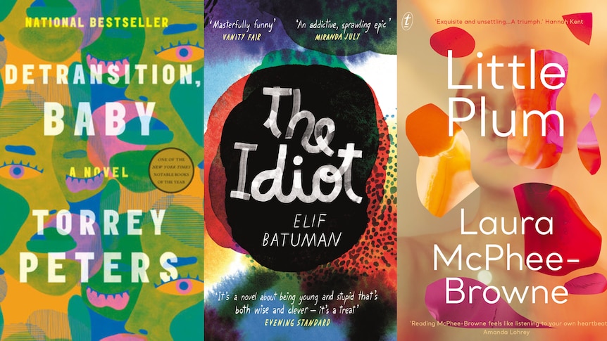 Three book covers with colourful blobs all over them