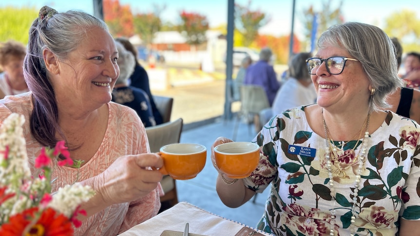 two women enjoying a cup of tea