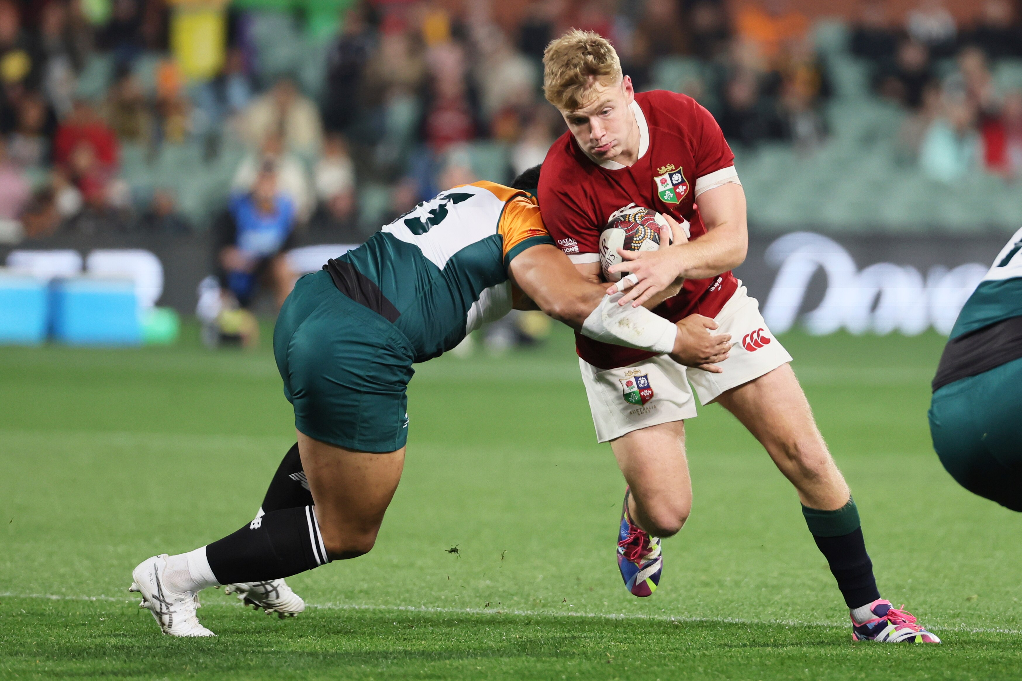 Fin Smith takes a tackle