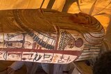 An Egyptian coffin inside a tent