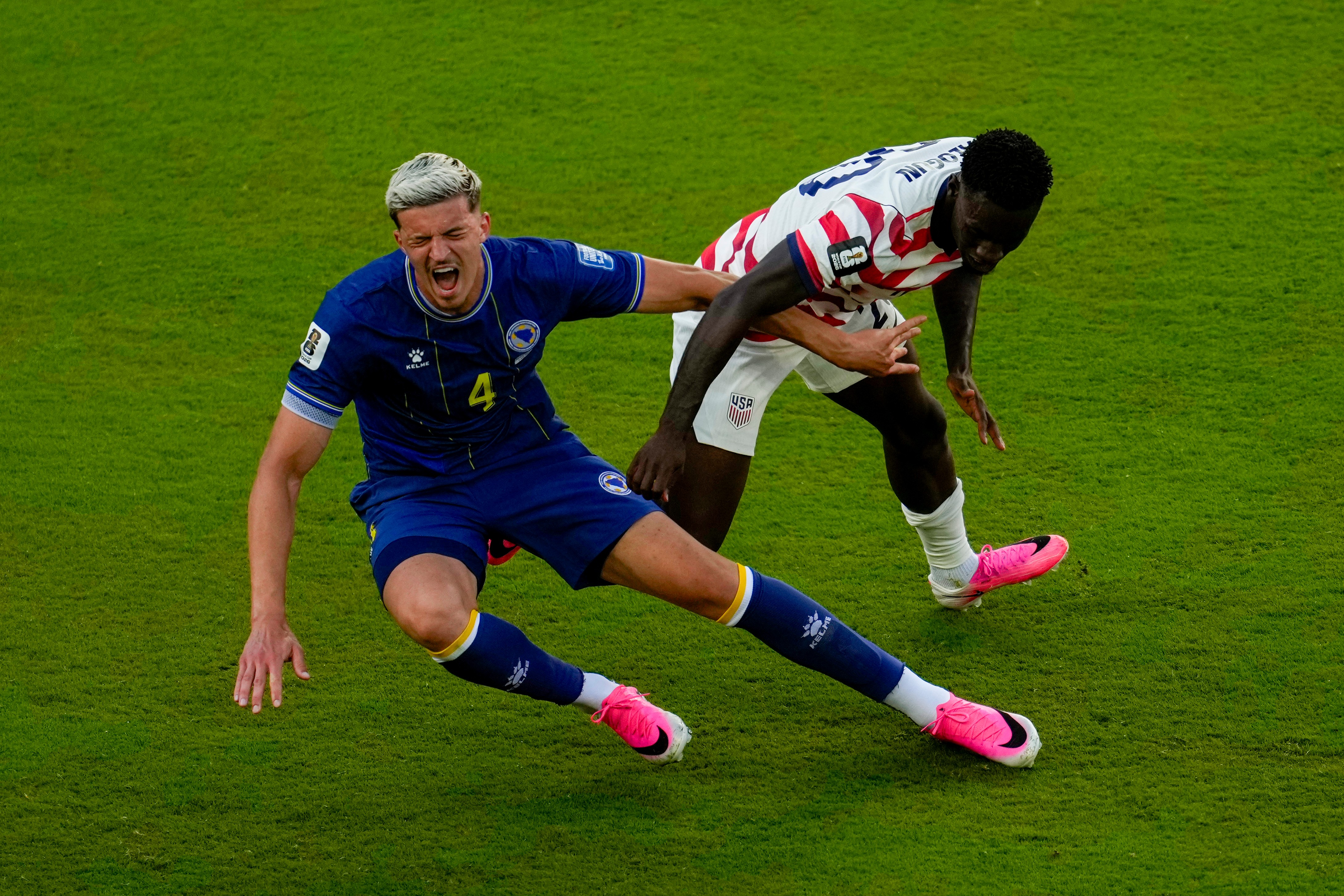 arik Muharemović falls as Folarin Balogun's foot is clear from his ankle.