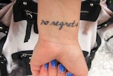 No regrets tattoo on wrist
