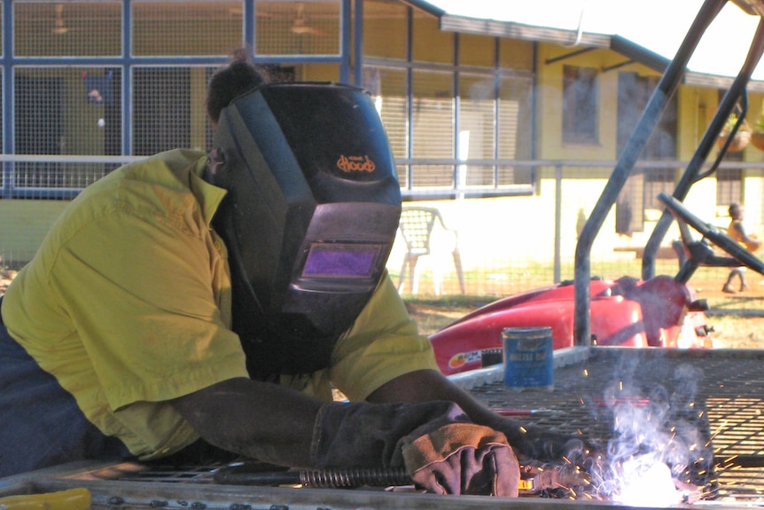 One of the team of welders in Robinson River hard at work