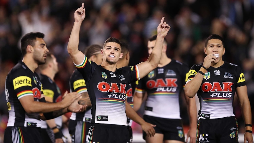 Nathan Cleary of the Panthers celebrates at full time against the Raiders in Penrith.
