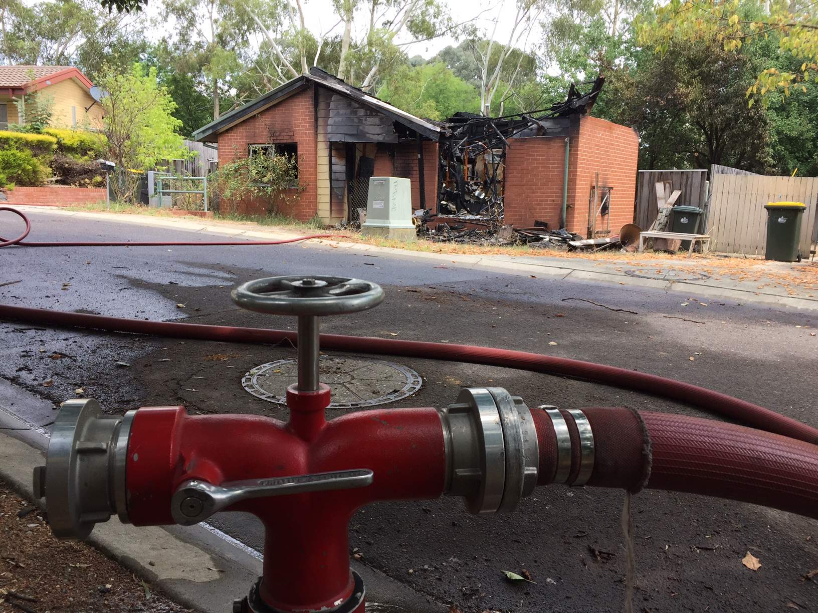 Man charged over Belconnen house fire that destroyed fiancée's home ...