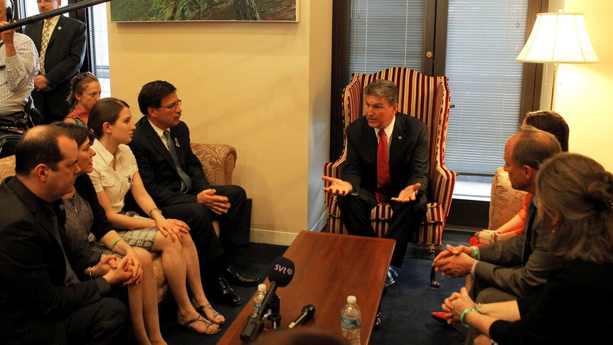 Senator Joe Manchin meets with relatives of the victims.