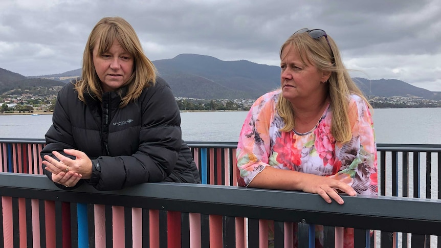 Tara Devine (left) and Aileen Britten on a bridge.