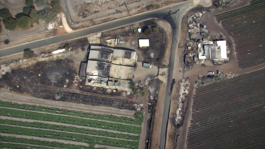 An aerial shot of a destroyed farm property