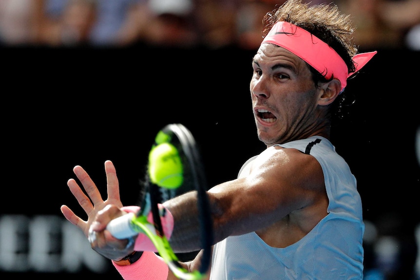 Rafael Nadal hits a forehand against Diego Schwartzman at the Australian Open