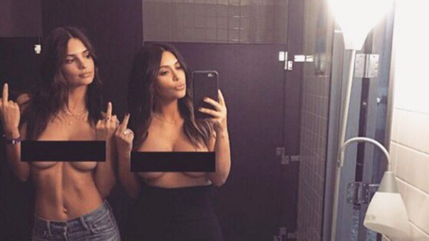 Kim Kardashian and Emily Ratajkowski pose for a topless selfie.