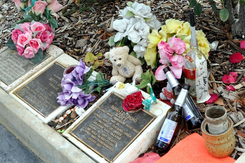 The grave of former AC/DC singer Bon Scott is decorated on the 30th anniversary Scott's death.