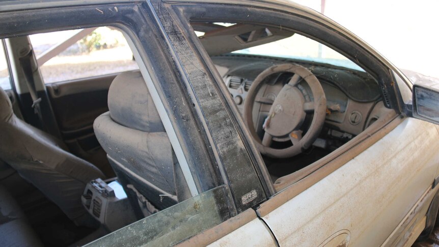 A car damaged by flood waters at Daly River community.