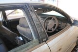 A car damaged by flood waters at the Daly River community.