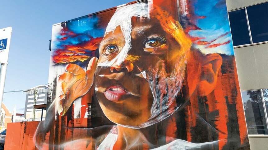 A photo of an Indigenous mural by Australian street artist Matt Adnate taken in Toowoomba, Queensland.