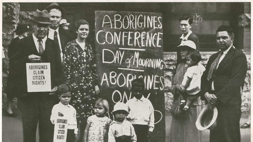Bill Ferguson holds sign that reads 'Aborigines claim citizens rights'.