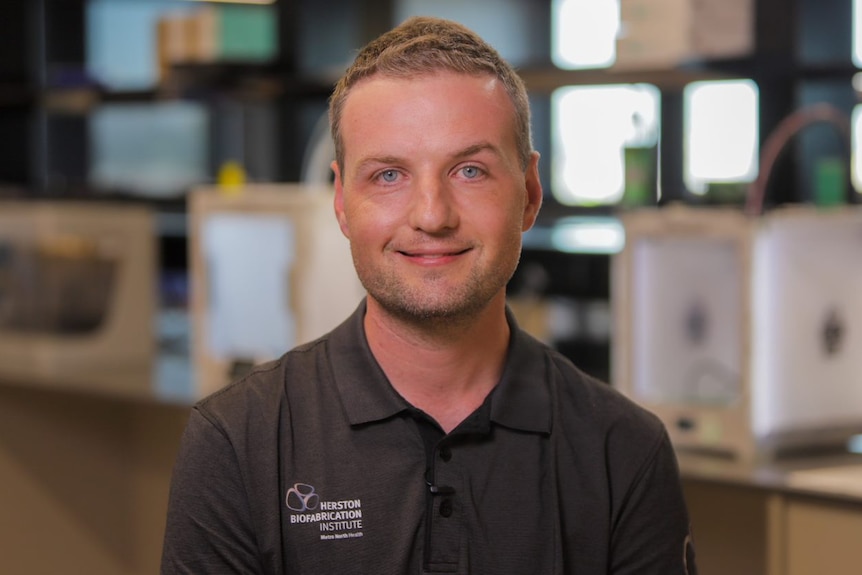 Senior research fellow James Novak wears a Herston Biofabrication Institute polo shirt