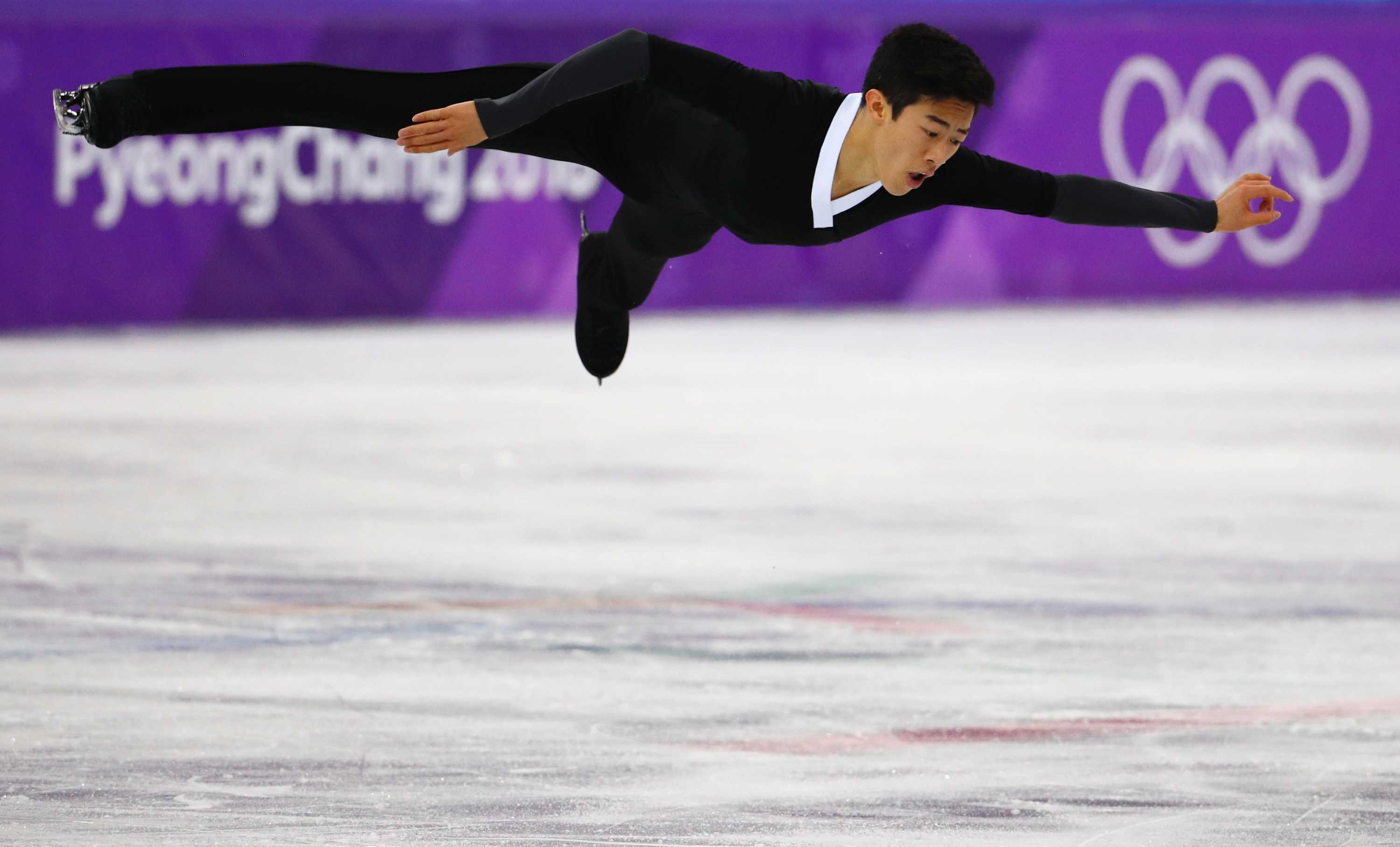 Winter Olympics Japan's Yuzuru Hanyu wins men's figure skating title