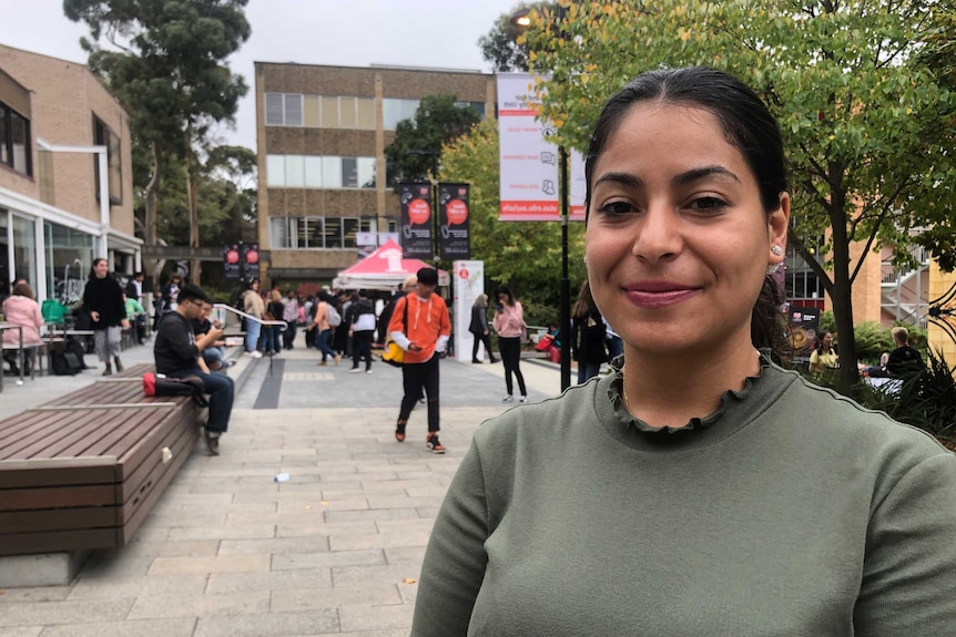 Galia Bastoni smiles in a street