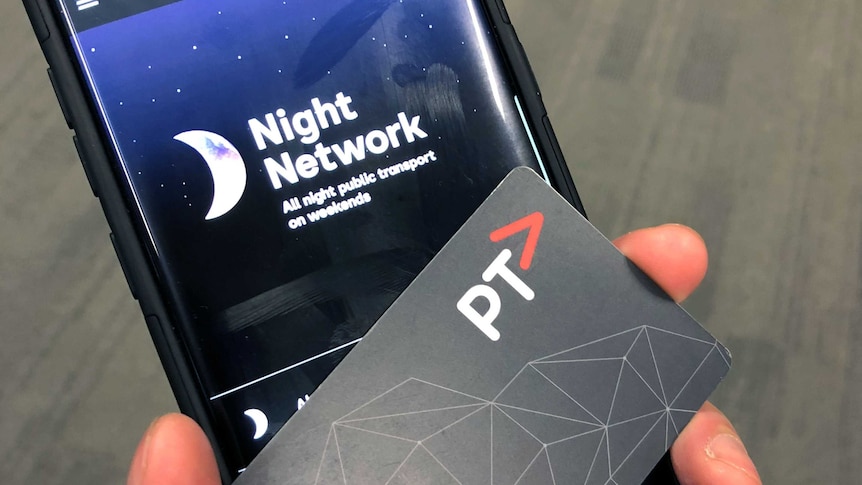 An Android phone with a night network sign on it and a PTV myki card.