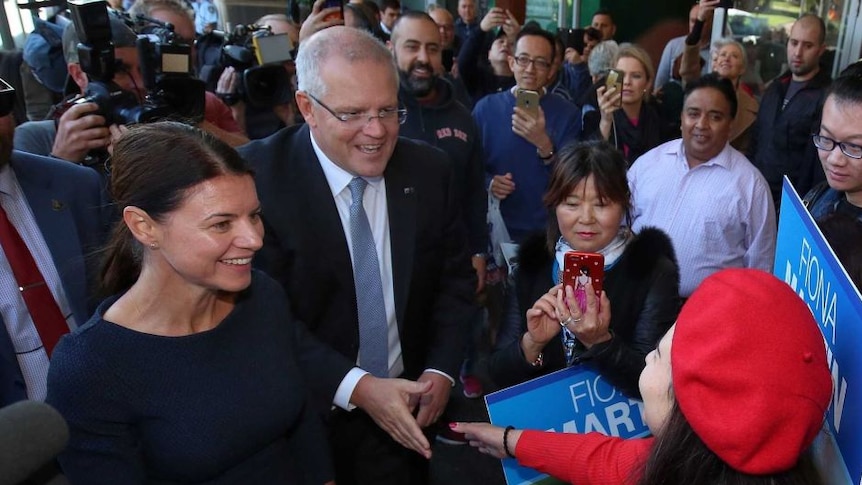 Scott Morrison and Fiona Martin in the middle of a big crowd