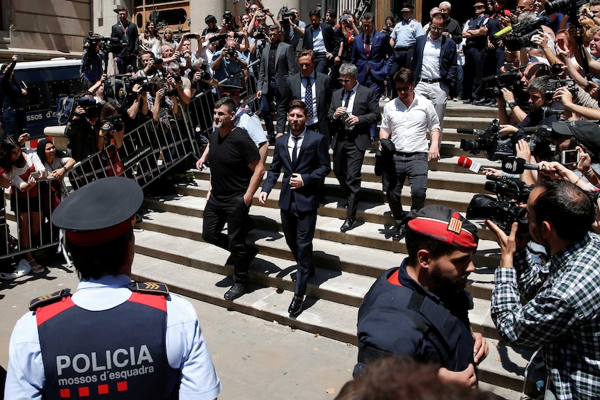 Lionel Messi leaves a Spanish court
