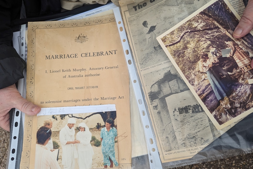 A photograph of clippings, photos and an old certificate from when Carol Astbury was appointed as a marriage celebrant