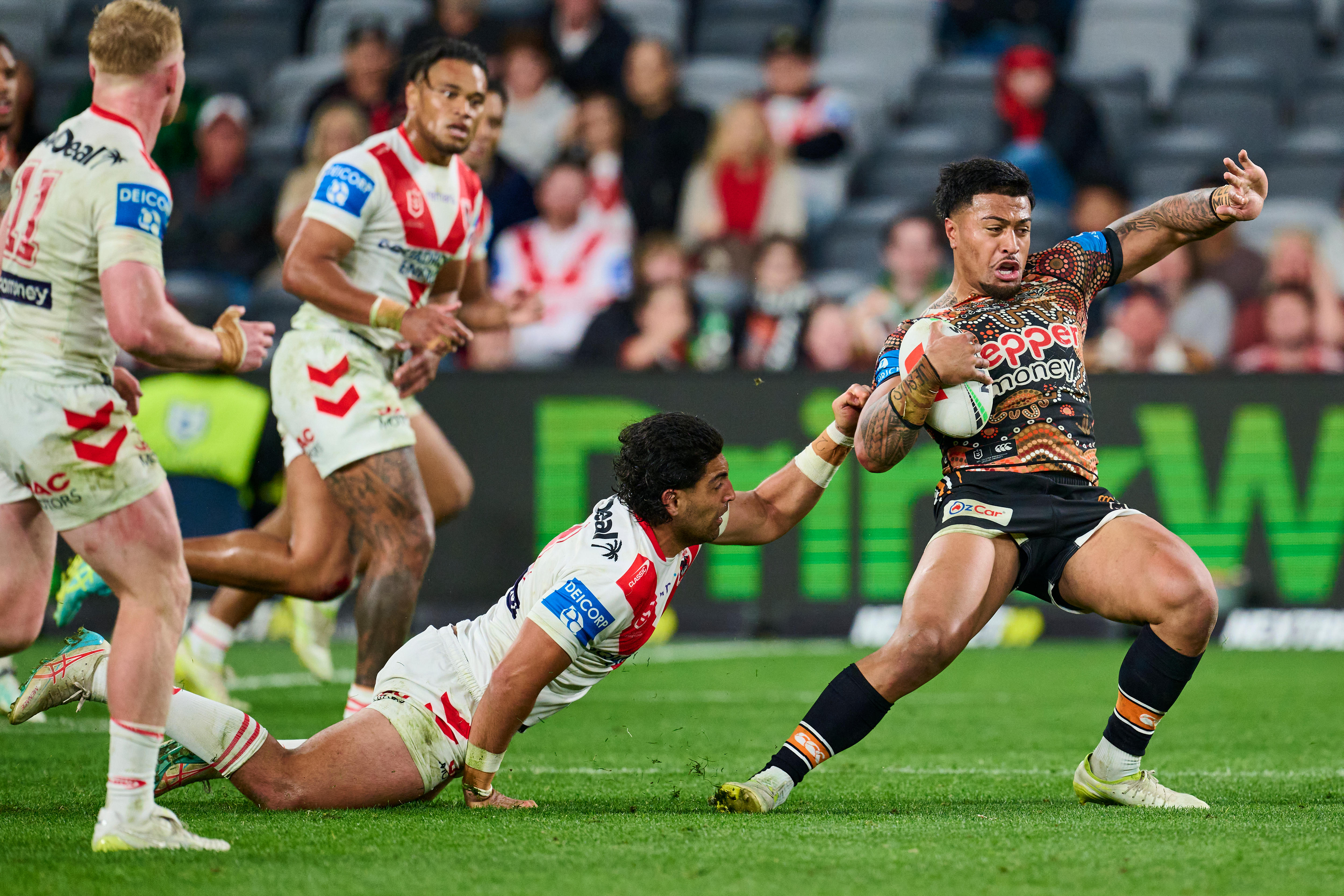 A man is tackled during a rugby league match