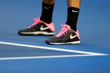 Federer shows off his new shoes
