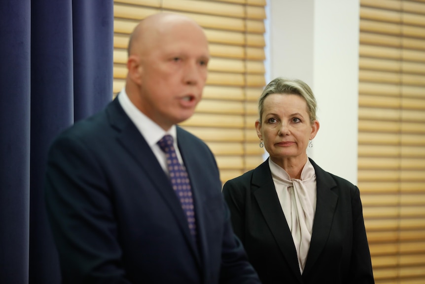 Sussan Ley, in focus, stands to the right of newly-elected Liberal leader Peter Dutton at a press conference after leadershi