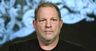 Disgraced Harvey Weinstein looks serious, straight ahead