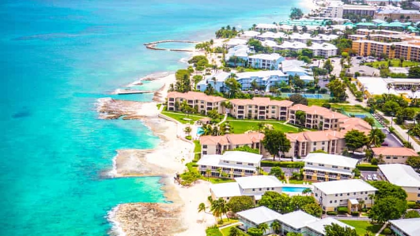 Luxury apartments line the shore of Grand Cayman island, a well known tax haven