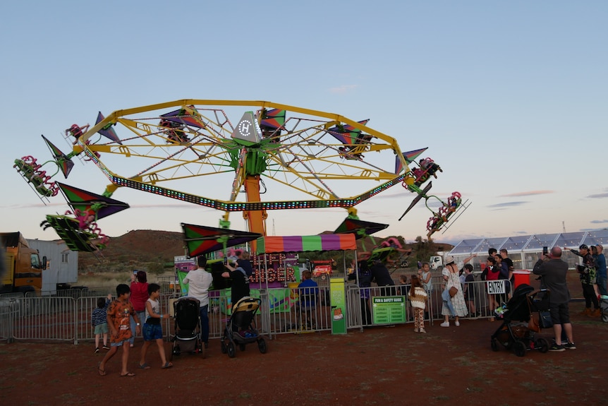 A colourful ride at a fair.