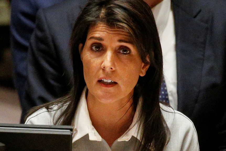Nikki Haley speaks from a seated position at the United Nations