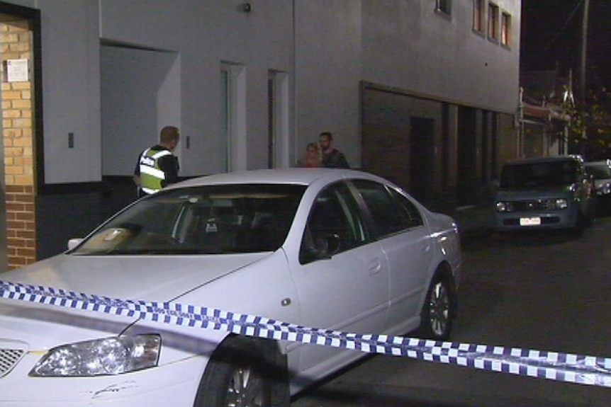 Cecil Street is cordoned off after a body is found in Fitzroy.