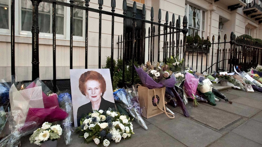 Flowers and mementos outside home of Margaret Thatcher.